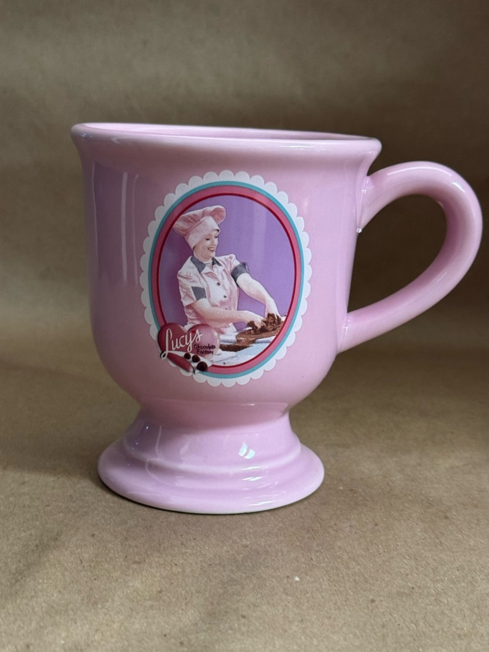 2005 I Love Lucy Candy Factory Pink Pedestal Coffee Tea Mug. 12 fl oz.